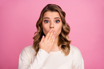Close-up portrait of her she nice-looking attractive lovely pretty charming confused wavy-haired girl closing mouth awkward news isolated over pink pastel color background - obrazy, fototapety, plakaty