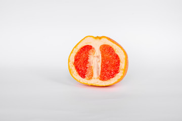 Half of grapefruit on a white background