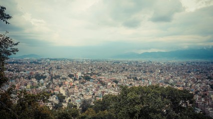 Obraz premium City view from above and trees with clouds