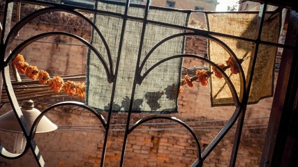 Heart shape black fence with brick walls