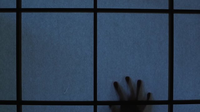 Ghost palms hitting Japanese Paper Door in Close up with sound
