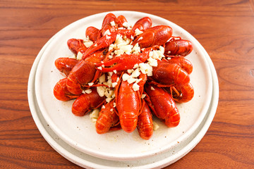 Chinese food with minced garlic and crawfish