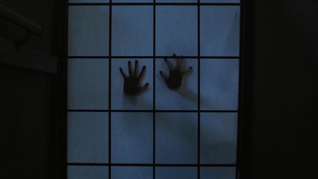 Spectral hands hitting Japanese Paper Door with sound