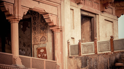Pillars connected to a wall with railings