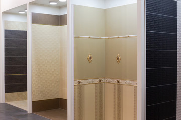Demo stands in building mall with different wallpapers and tiles