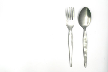 Spoon and rehearsal isolate on white background.