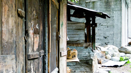 Wooden shack with a wooden  door attached