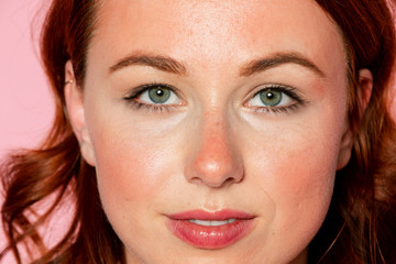 Beautiful woman with sun-kissed cheeks