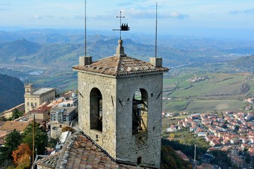 The watchtower in the 11th century Fortress of Guaita or Rocca on Monte Titano (Mount Titan) with...