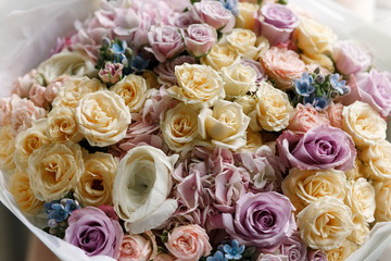 Spring pastel bouquet with roses closeup. Flower shop.