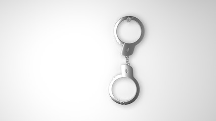 Closed police handcuffs close-up on a white background.