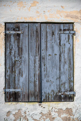 An old weathered wooden door in an ancient building