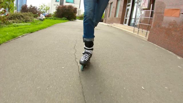 Man skating on inline skates outdoor