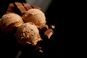 fresh delicious chocolate ice cream on black