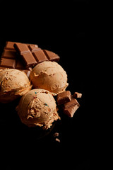 fresh delicious chocolate ice cream isolated on black