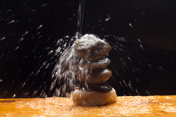 Water falling on some stones