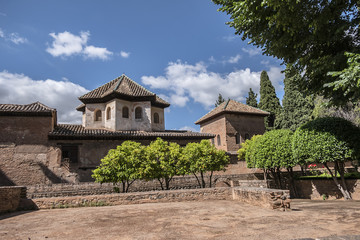 Beautiful garden with fountain in Granada Alhambra. Granada, Andalusia, Spain.