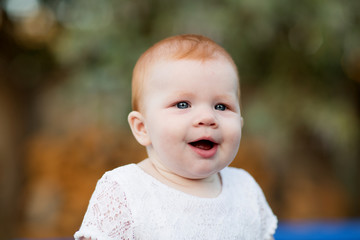 Portrait of cute seven month old baby girl