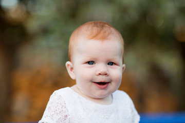 Portrait of cute seven month old baby girl