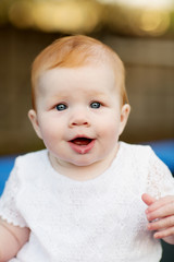 Portrait of cute seven month old baby girl