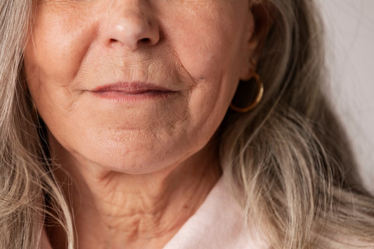 Cropped face of a happy senior woman