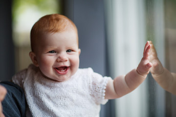 Portrait of cute seven month old baby girl