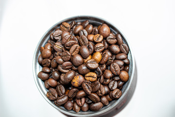 Closeup picture of coffee bean grinder and coffee bean