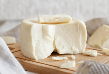 South Italian cheese cacioricotta with a grater