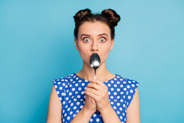 Closeup photo of beautiful lady holding metal spoon hiding mouth look big eyes see tasty food...
