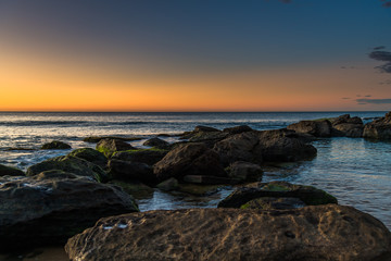 Rocky Sunrise Seascape at the Beach