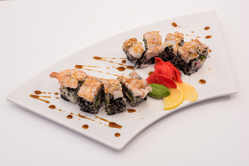  sushi in a plate on a white background