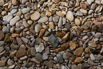 the texture of the wet, small stones