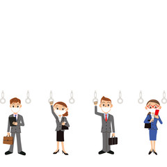 吊革の間隔をあけて電車通勤をする会社員