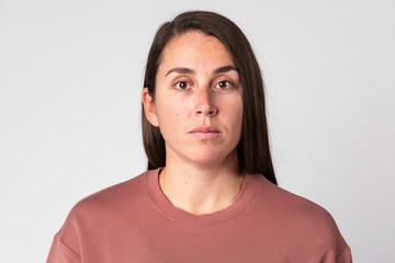 Brunette woman in a neutral mood