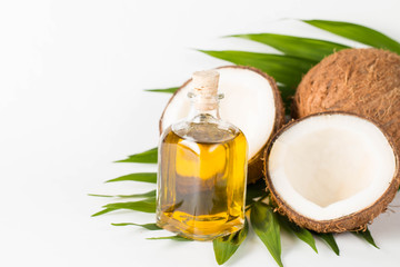 Ripe half cut coconut on a wooden background. Ripe half cut coconut on a wooden background. Coconut cream and oil.