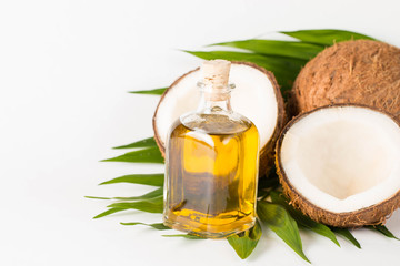 Ripe half cut coconut on a wooden background. Ripe half cut coconut on a wooden background. Coconut cream and oil.