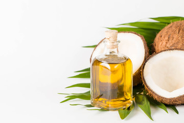 Ripe half cut coconut on a wooden background. Ripe half cut coconut on a wooden background. Coconut cream and oil.