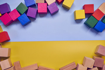 colorful wooden cubes playing cubes at home with friends