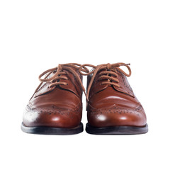 Classic brown leather pair of shoes standing front
