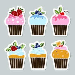 Set of vector cupcake stickers isolated on gray background. Food design elements for the menu, bakery logo, web, postcards, stickers.