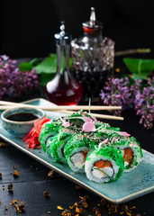 Sushi rolls with chuka served