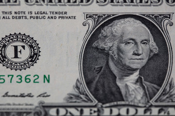 Closeup of front side of 1 dollar bill