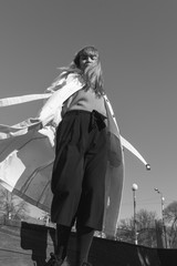 young girl in a raincoat fashion photo