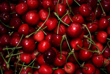 red ripe sweet cherries background, pattern.