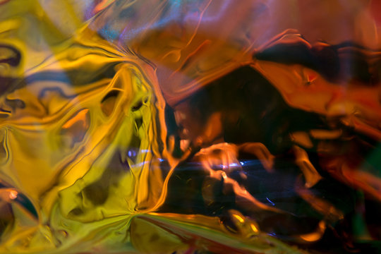 Abstract trendy holographic background with neon colors.