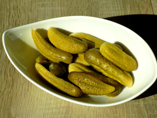Home Made Pickles served on nice white bowl