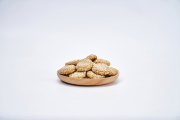 Homemade sesame cookies against a white background during the pandemic
