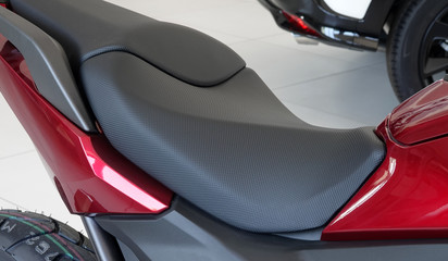 Obraz na płótnie Canvas Motorbike seat new modern made of artificial material motorcycle salon