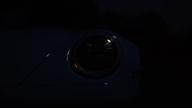 The light will disappear. The sports car's headlight stops working. Turn off the lamp.