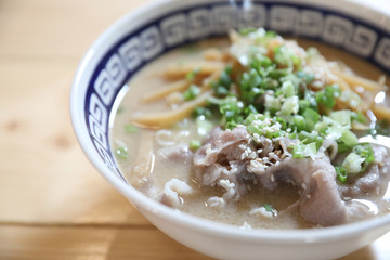 Ramen Japanese noodle soup food with noodle and pork on wooden table